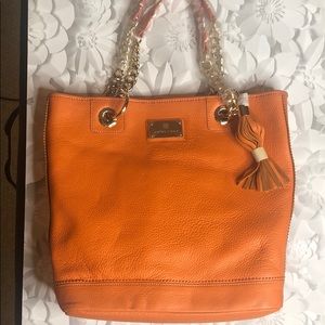 Trina Turk orange leather purse